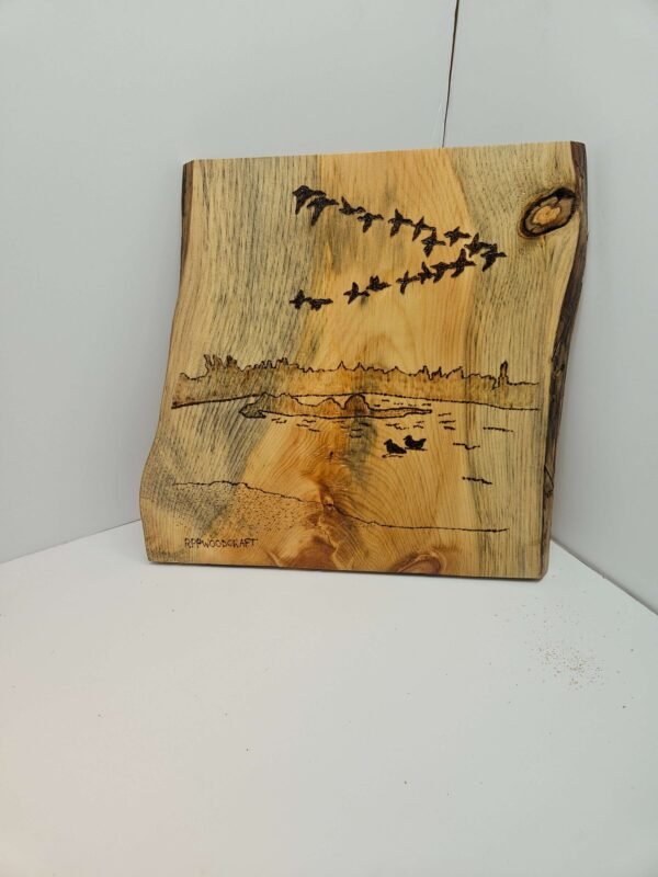 Ducks in flight on live-edge pine