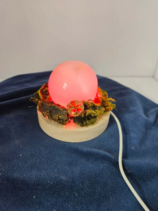 Two-inch agate sphere with dried greenery