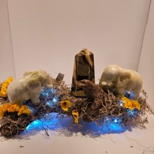 Two green jade elephants and septarian tower with fairy lights.