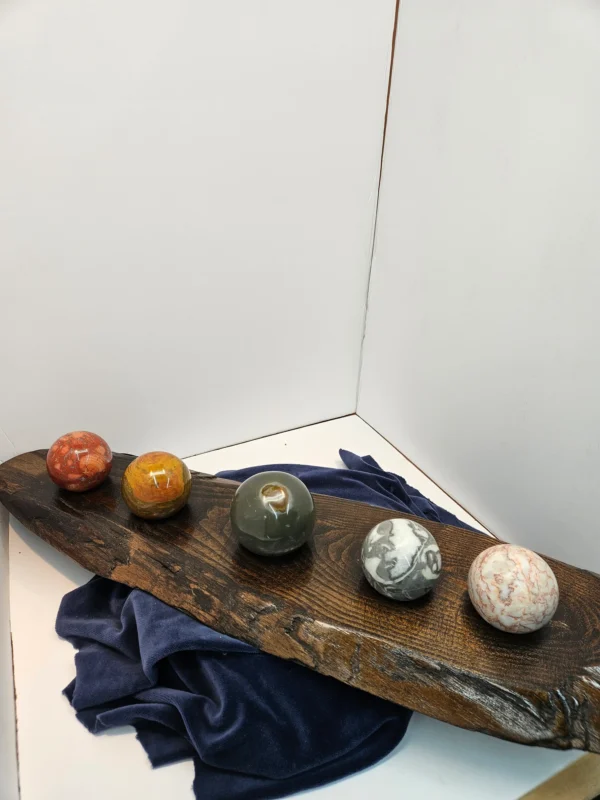 flight of jasper on wooden stand.
