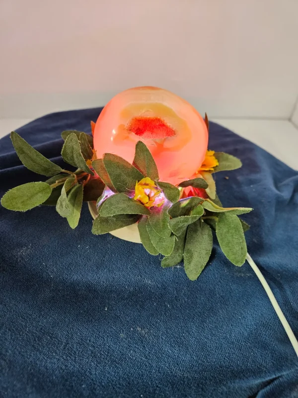 Druisy golden agate  free form on lighted stand