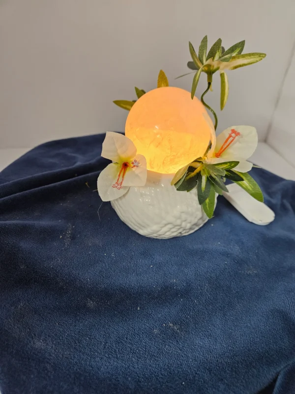 Medium rose quartz sphere on ceramic stand