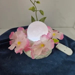 Medium rose quartz sphere on ceramic stand