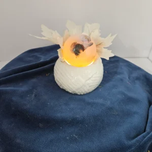 smal agate sphere on ceramic stand