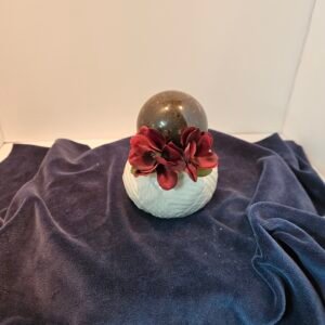 Mahogany obsidian sphere on ceramic stand